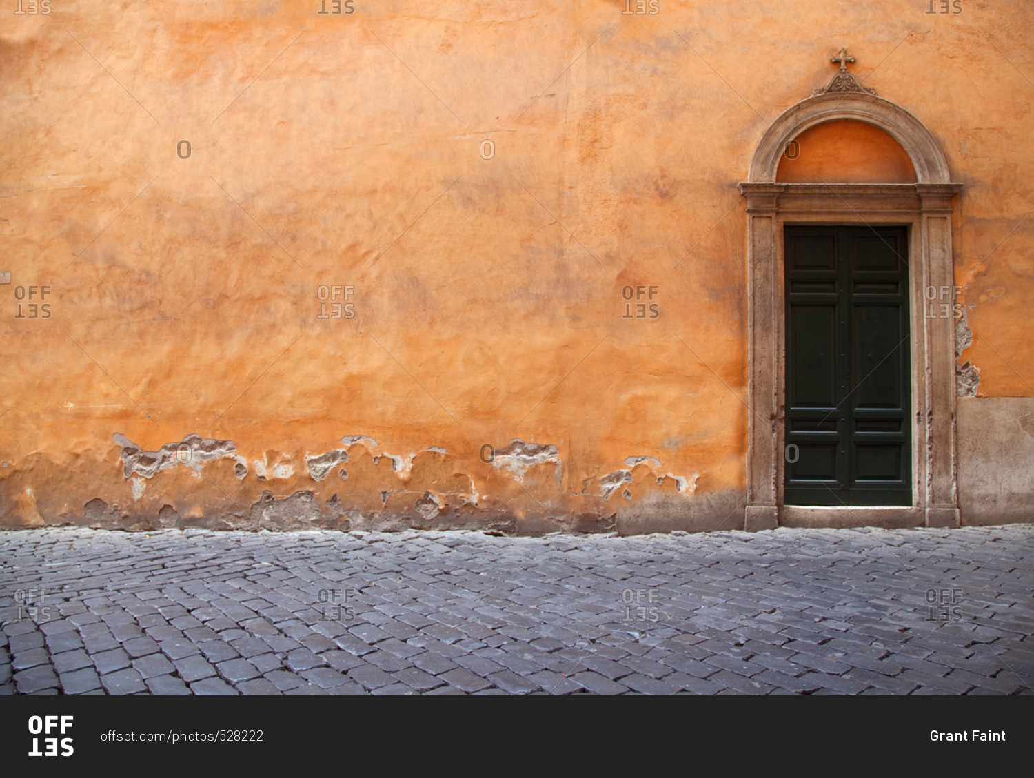 Orange wall and door Rome, Italy