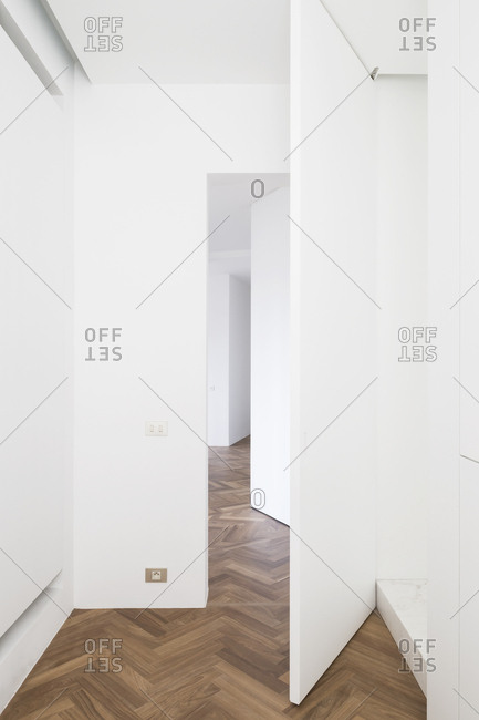 Door In Empty Home With Hardwood Floors Stock Photo Offset