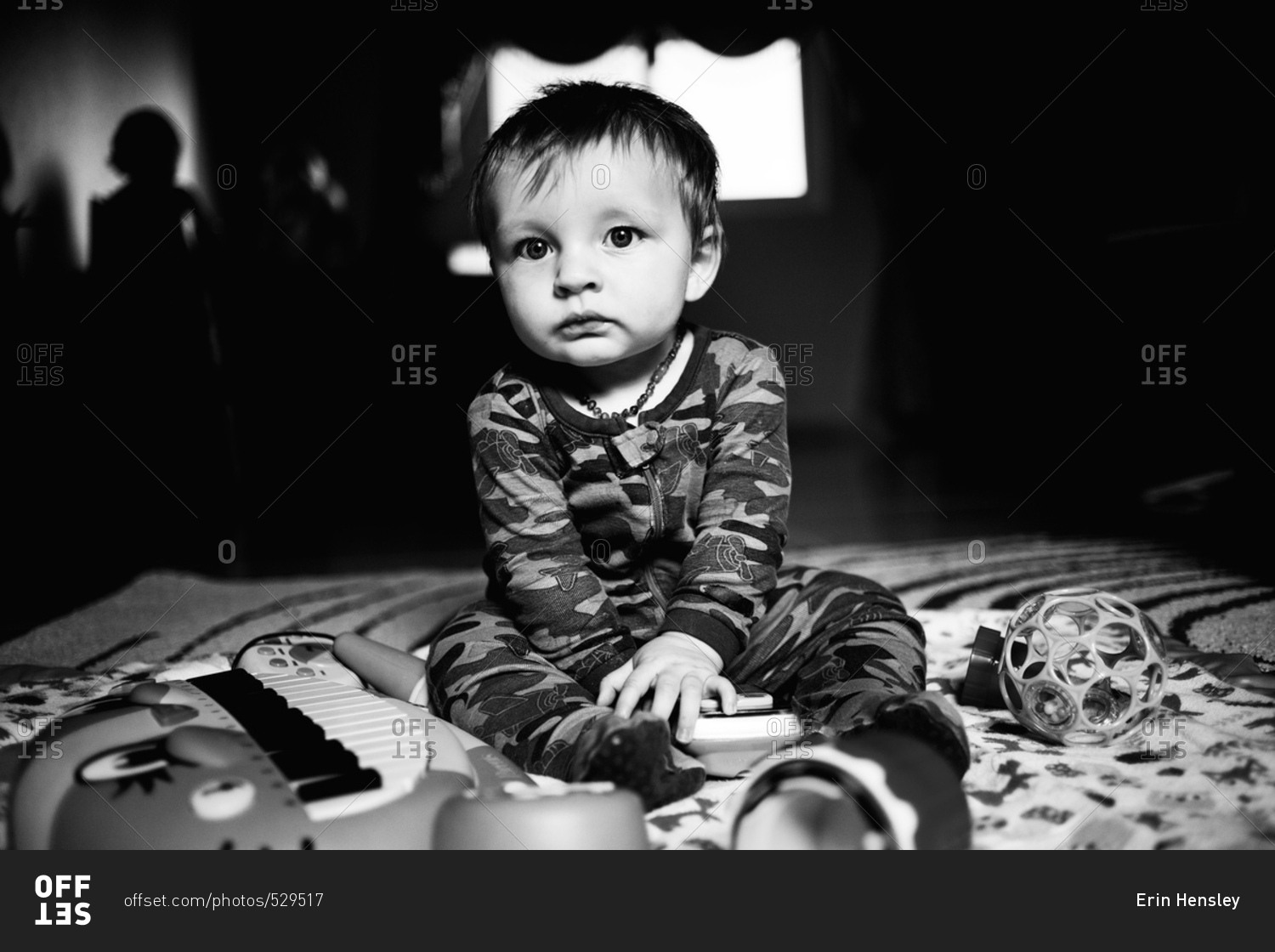 Toddler on floor in high contrast photo