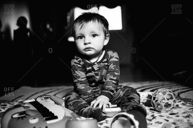 Toddler on floor in high contrast photo