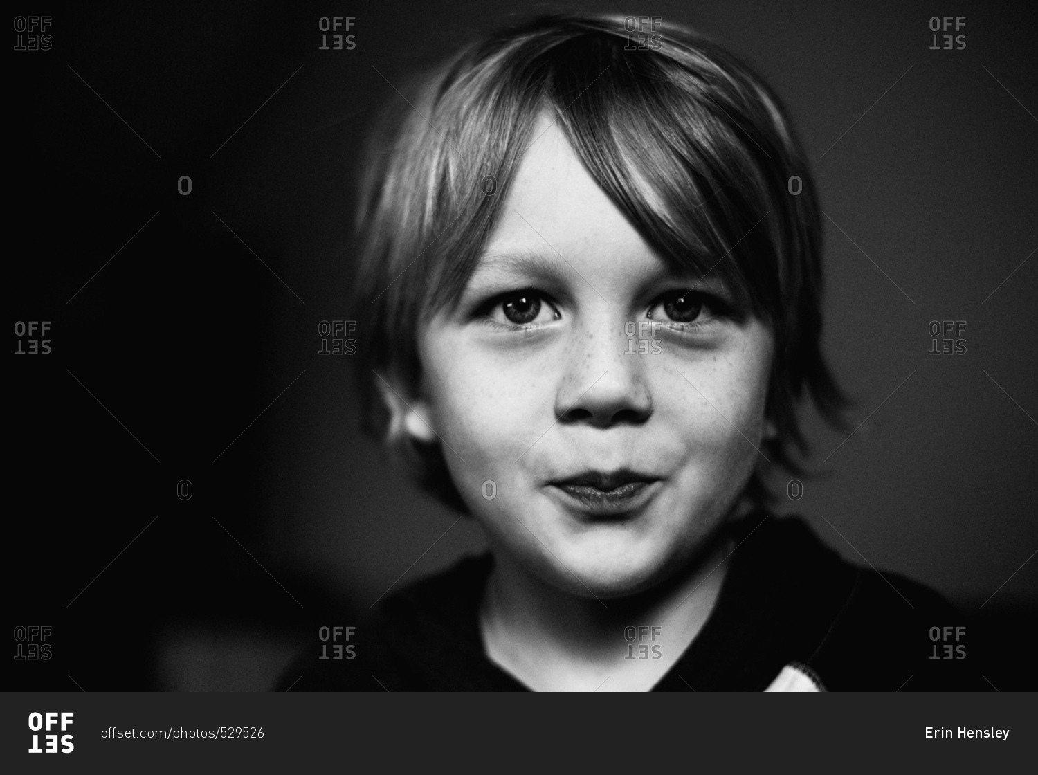 Smiling boy in black and white