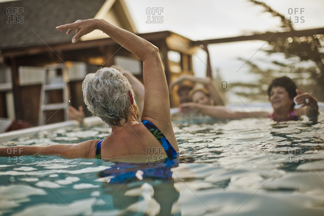 Women doing aqua aerobics in a swimming pool