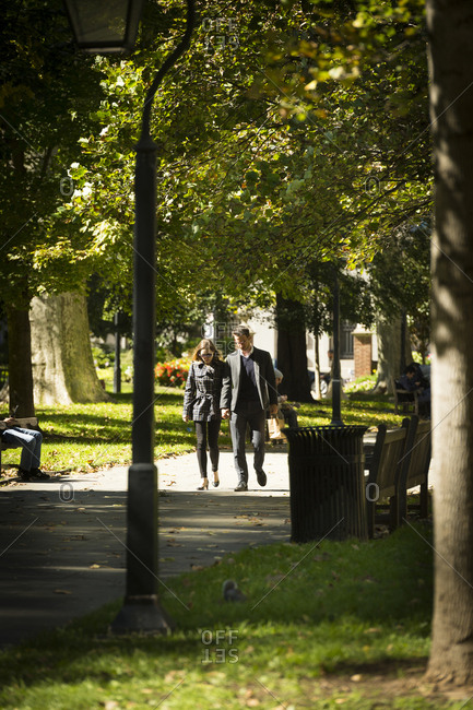 Philadelphia, Pennsylvania - October 10, 2016: A couple walks in a park