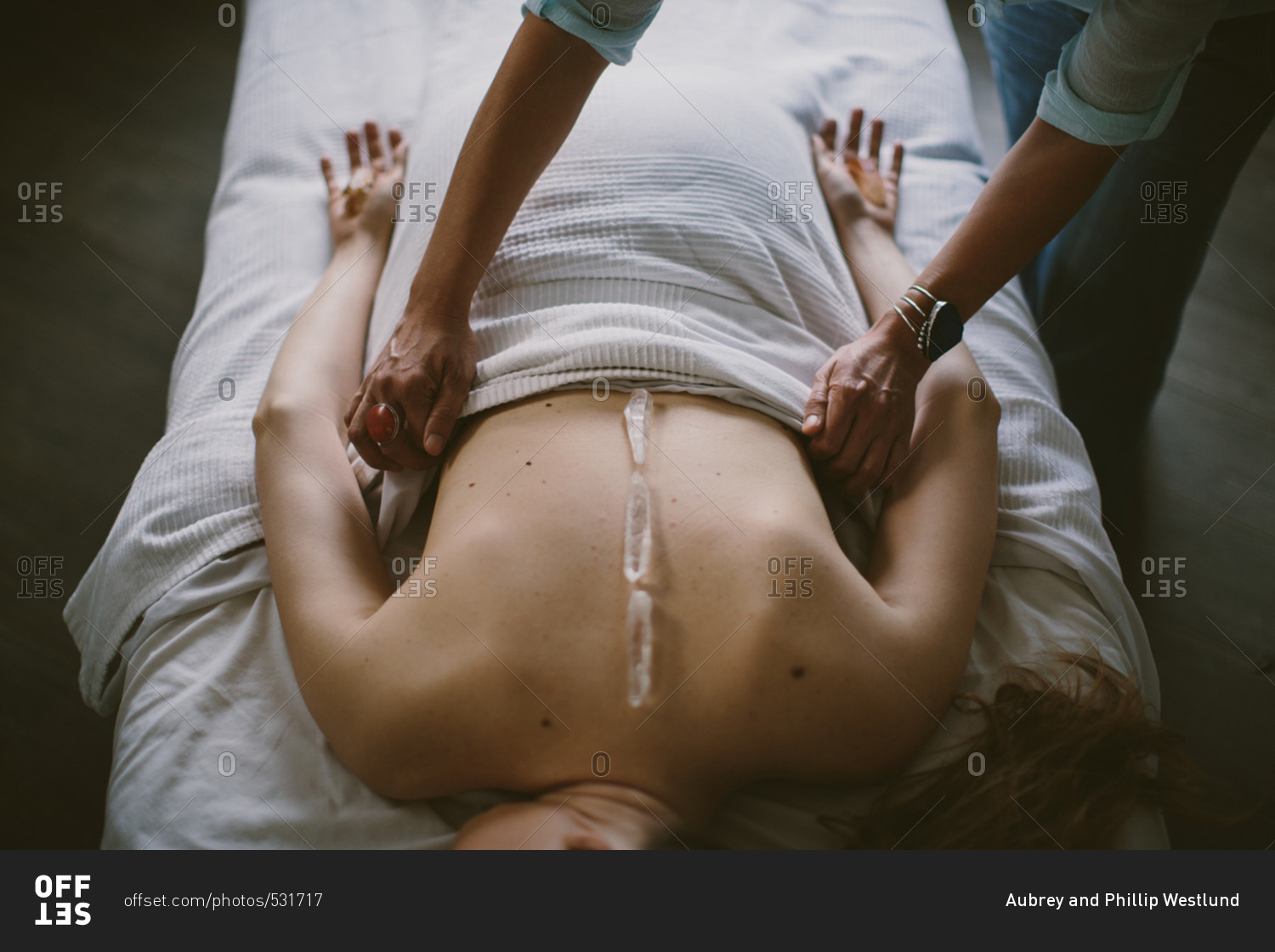Massage with crystals  on back