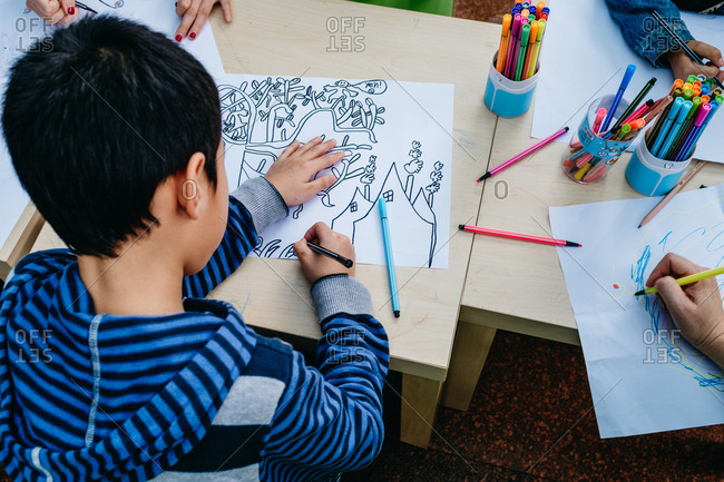 Asian boy drawing