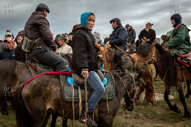 Altai Mountains, Mongolia - July 11, 2016: Kazakh people on horses