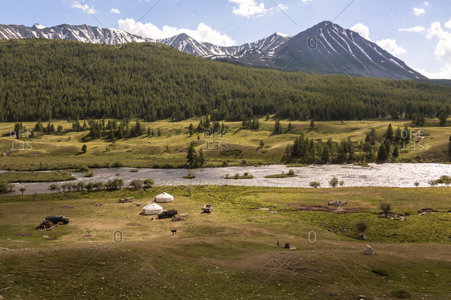 Altai Mountains, Mongolia - July 14, 2016: Kazakh settlement near river and mountains