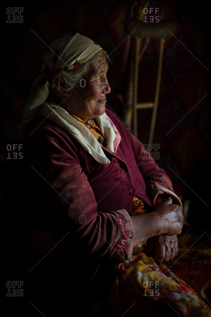 Altai Mountains, Mongolia - July 15, 2016: Old Kazakh woman sitting in chair