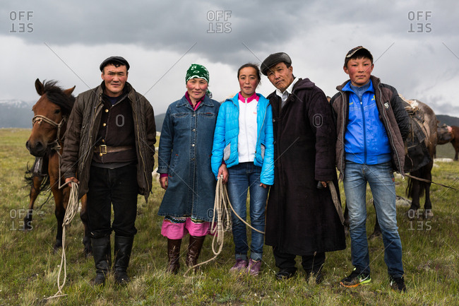 Altai Mountains, Mongolia - July 18, 2016: Kazakh family with horses