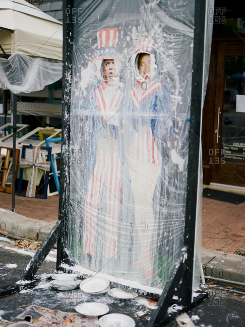 Pittsboro, North Carolina - March 24, 2017: A carnival game of "Pie in the Face" depicting 2016 political figures covered in whipped cream pie