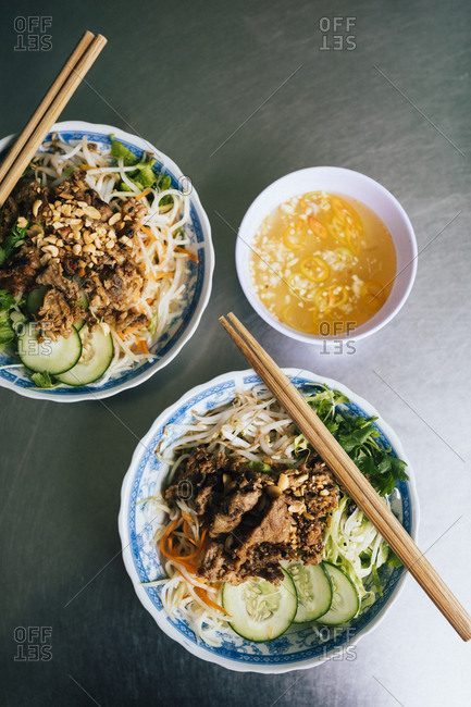 Bun thit nuong, rice noodles with grilled pork and fresh herbs