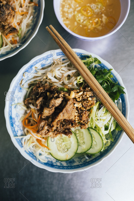 Bun thit nuong, rice noodles with grilled pork and fresh herbs