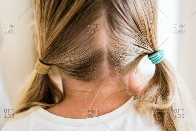 Rear View Of A Blonde Girls Pigtails Stock Photo Offset