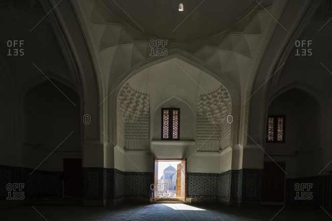 Samarkand, Samarkand, Uzbekistan - November 12, 2016: Distant doorway in ornate mausoleum