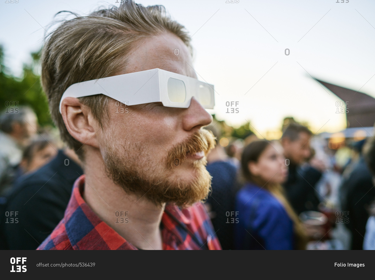 Sweden, Uppland, Stockholm, Djurgarden, Portrait of blonde man with glasses at concert