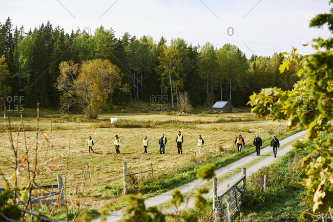 Sweden, Uppland, Rison, Volunteers helping emergency services find missing people