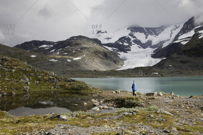 Norway, Tourist walking in Jotunheimen range