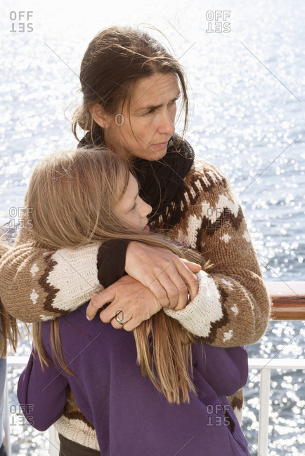 Sweden, Sodermanland, Portrait of mother and daughter embracing on cruise ship