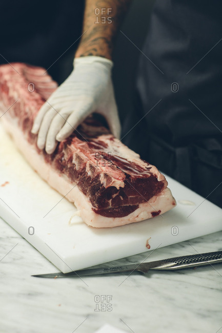 Sweden, Butcher preparing meat - Offset