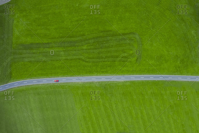 Fire engine driving on country road - aerial view