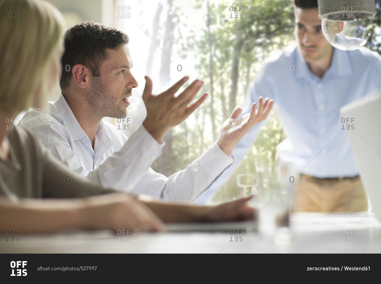 Business people brainstorming in a team meeting in office