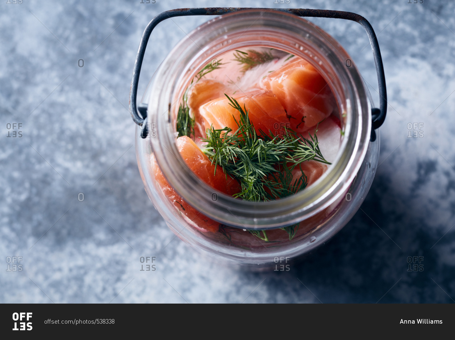 Pickled salmon pieces in jar