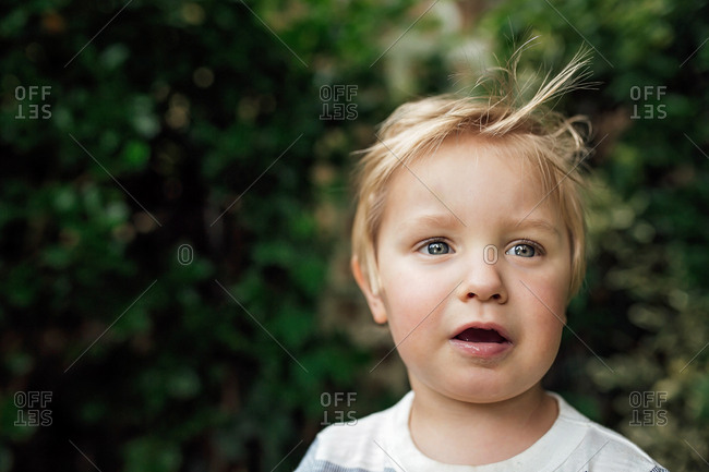 little boy with blonde hair and green eyes