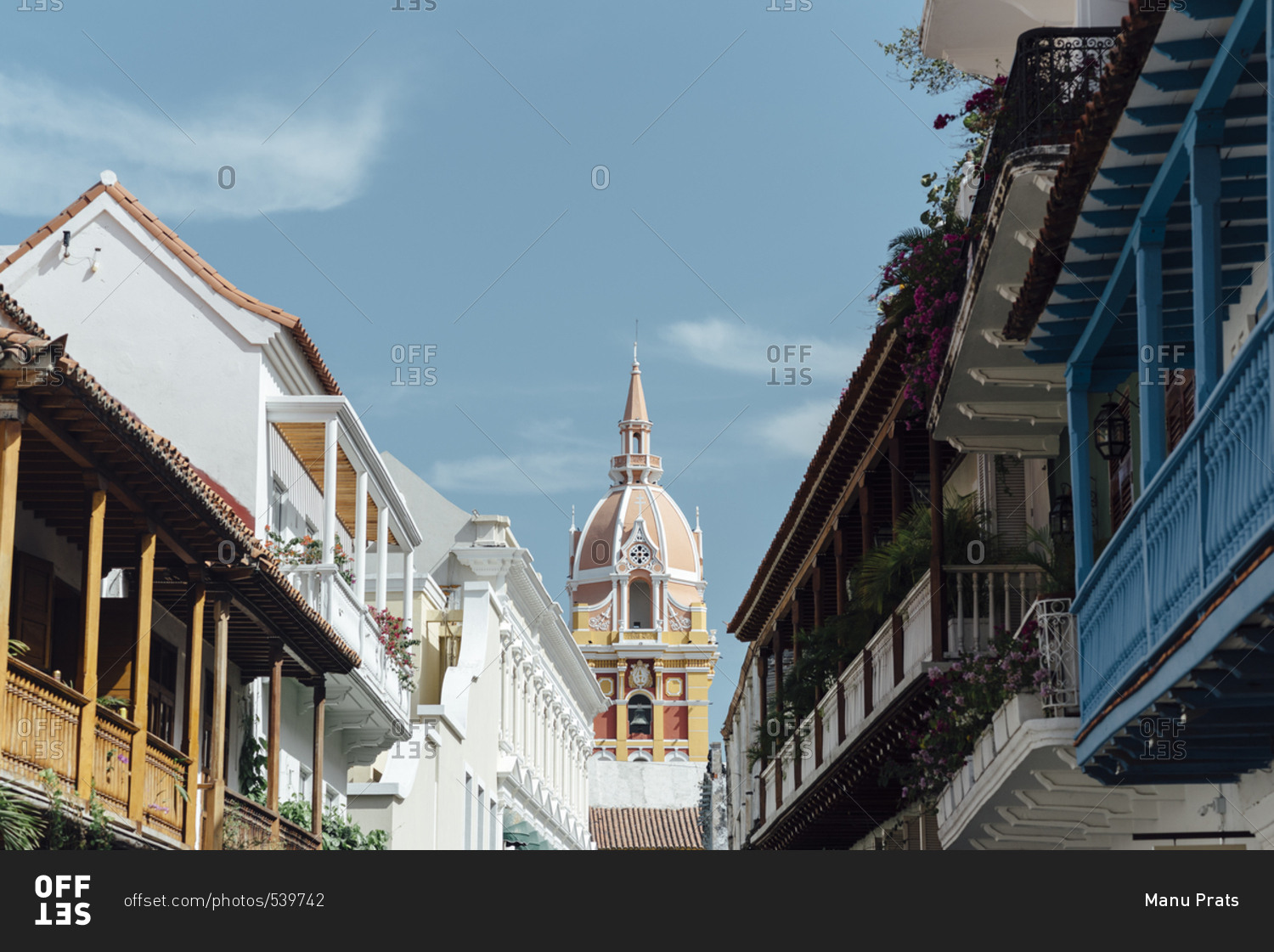 Main street of the walled city of Cartagena de Indias close to a church in Cartagena de Indias, Colombia
