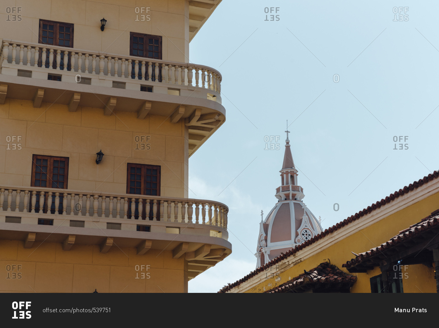 Colonial balconies beside a church in the walled city of Cartagena de Indias, Colombia