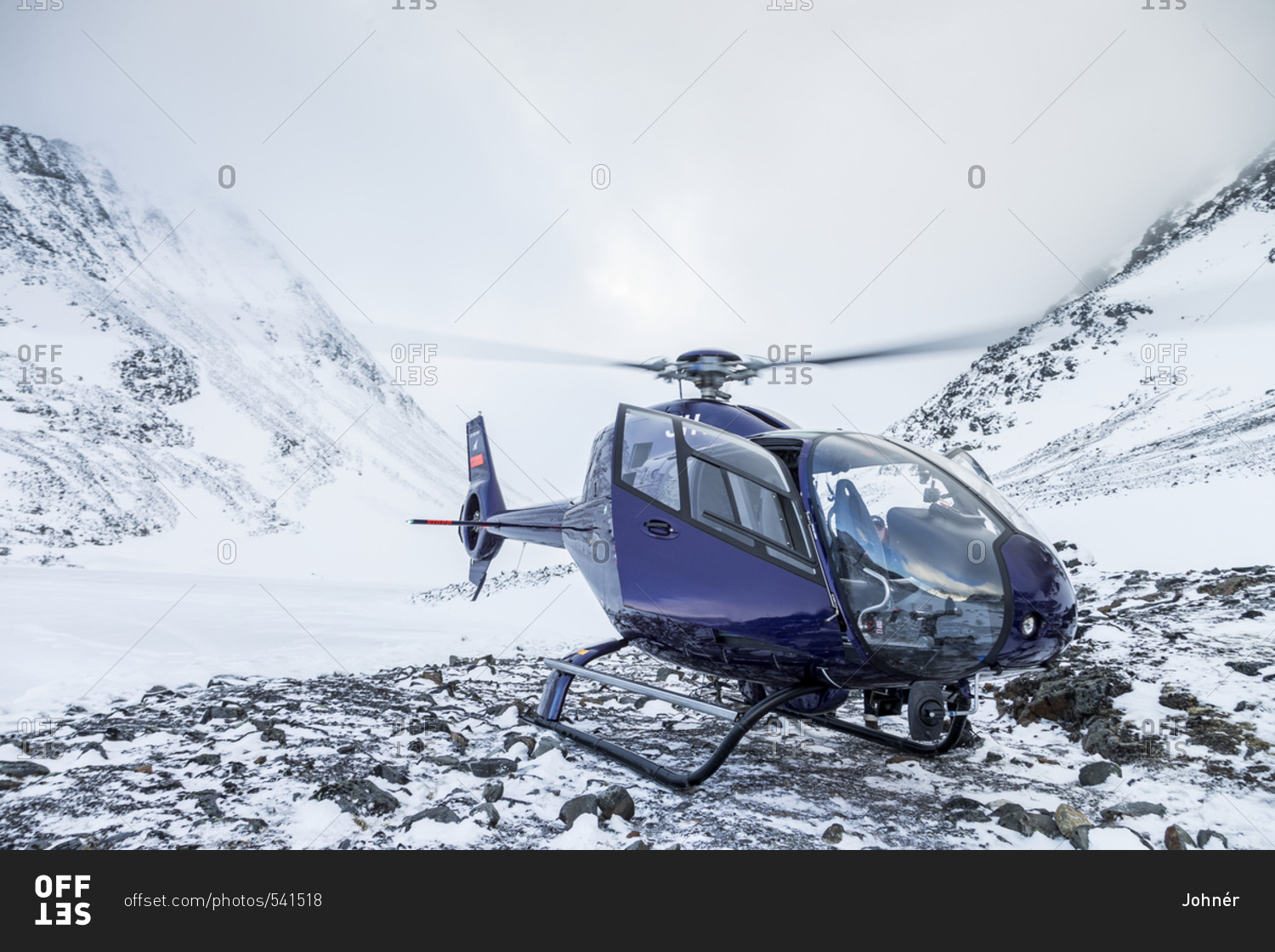 Helicopter in snowy landscape