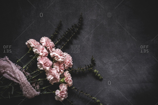 Flowers on black background, Flat lay, top view, Flowers background