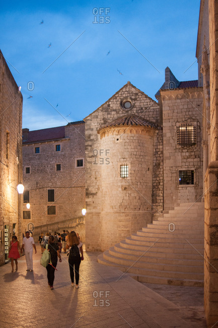 Dubrovnik, Croatia - July 22, 2015: People walking at dusk in Old Town Dubrovnik, Croatia
