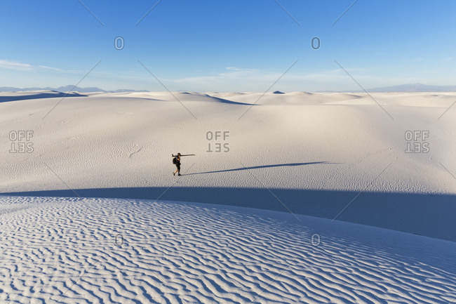 USA- New Mexico- Chihuahua Desert- White Sands National Monument- photographer on dune