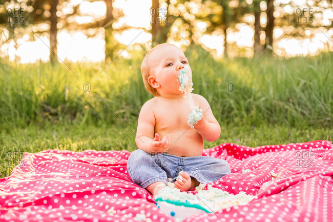 One year old boy at a cake smash