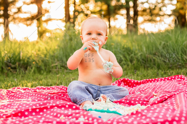 One year old boy at a cake smash