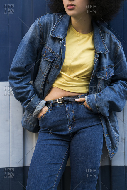Young woman wearing jeans and jeans jacket