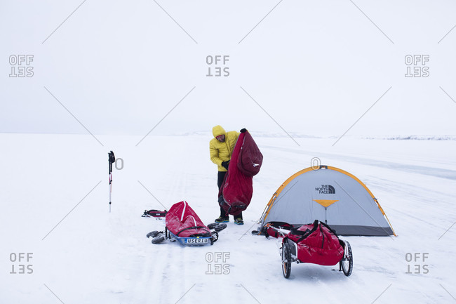 Mackenzie River Ice Road, Northwest Territories, Canada - May 29, 2015: Tiberiu Useriu, who won the non-stop self sufficient 352.64 miles (566km) 6633 Arctic Ultra foot race, is photographed near the finish outside Tuktoyaktuk, Northwest Territories, Canada, March 17, 2016.