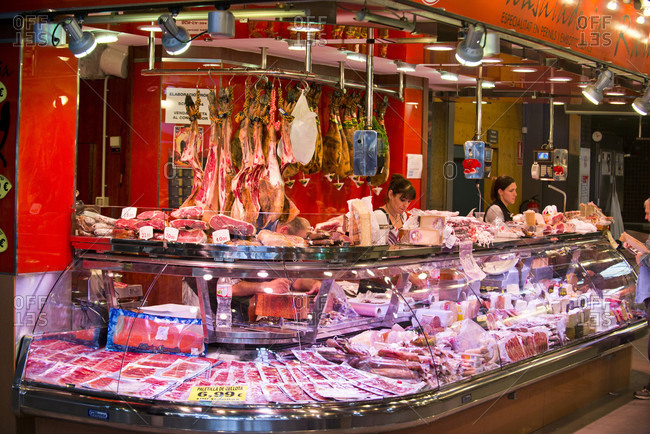 Barcelona, Barcelona, Spain - November 24, 2015: Assorted cuts of meat are on display at a butcher shop in Barcelona, Spain.