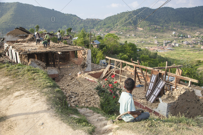 Lele Village, Bagmati, Nepal - May 4, 2015: Houses have fallen down but people are standing tall.