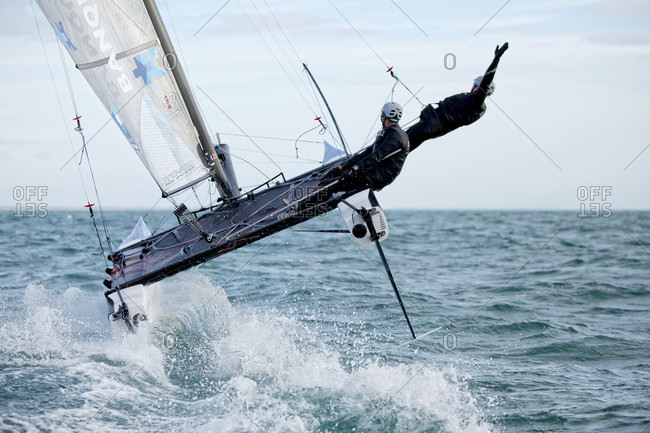 Lorient, Brittany, France - December 10, 2015: Armel Le Cl_ac'h and Kevin Escoffier from the Banque Populaire Sailing Team and the Flying Phantom. The Flying Phantom is a new generation of foiling catamarans design by Martin Fisher.