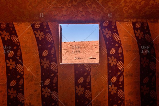 View of desert landscape of Wadi Rum in Jordan through window opening in tent