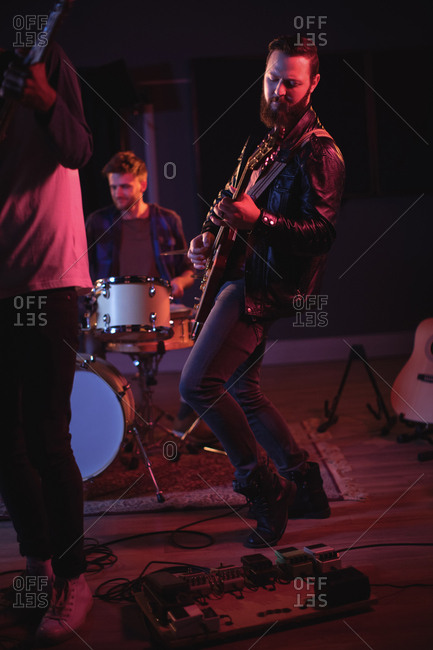 Band performing in recording studio