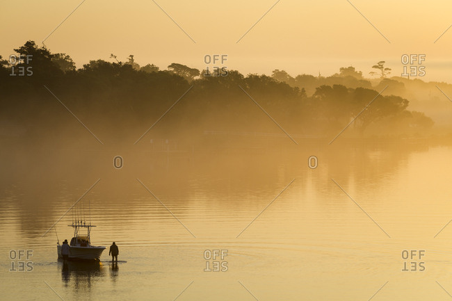 Beached fishing boat at sunrise
