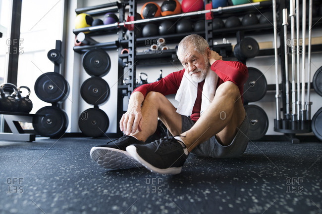 old man workout in gym stock photos OFFSET