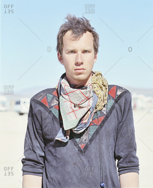 Portrait of confident man standing in desert on sunny day, Black Rock Desert, Nevada, USA