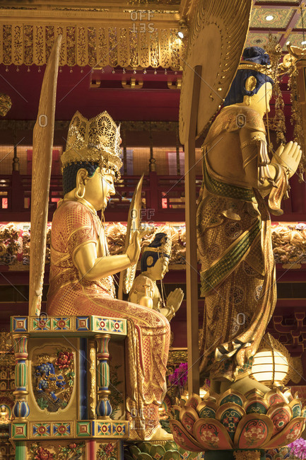 Buddha statues in Buddha Tooth Relic Temple, Chinatown, Singapore