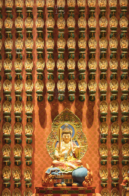 Buddha statues in Buddha Tooth Relic Temple, Chinatown, Singapore