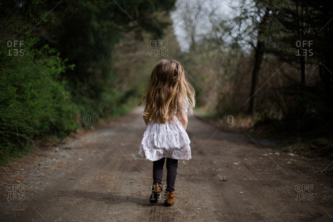little girl walking away