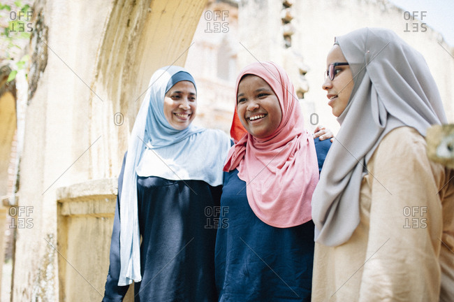 Three Malaysian women in Islamic dress