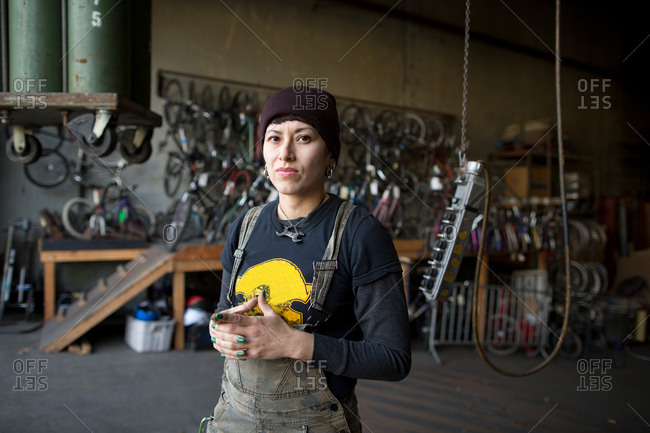 Portrait of female metalsmith in workshop